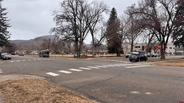 a bathroom with a sink and shower