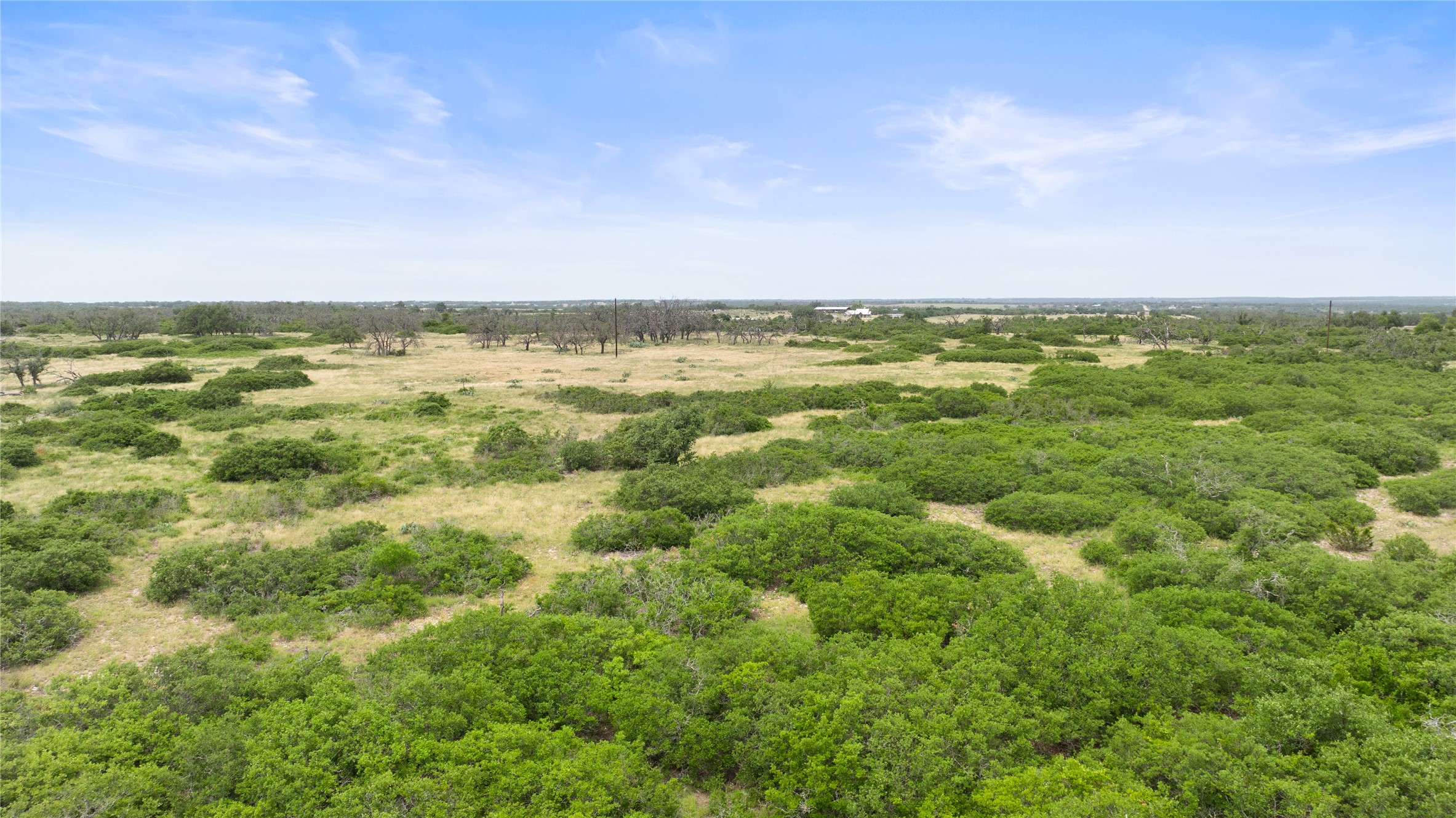 3049 Reservation Road Harper, TX 78631 - Photo 13 of 40 a view of a city with lush green forest
