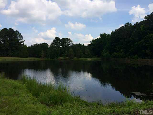 7628 Weathered Oak Way, Unit LT159 Raleigh, NC 27616 - Photo 7 of 11 Enjoy the scenic pond with future Raleigh Greenway Trail!