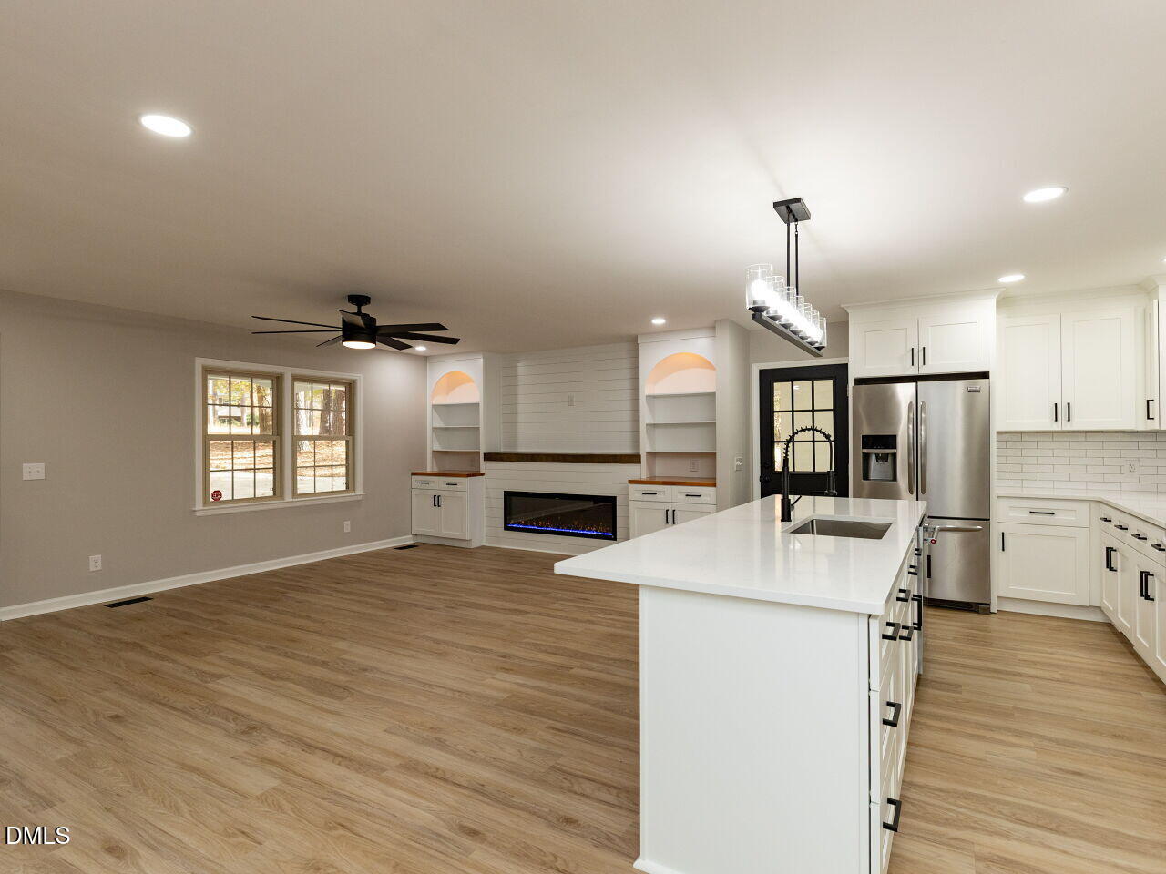 4800 Theys Road Raleigh, NC 27606 - Photo 11 of 43 a view of kitchen with cabinets and wooden floor