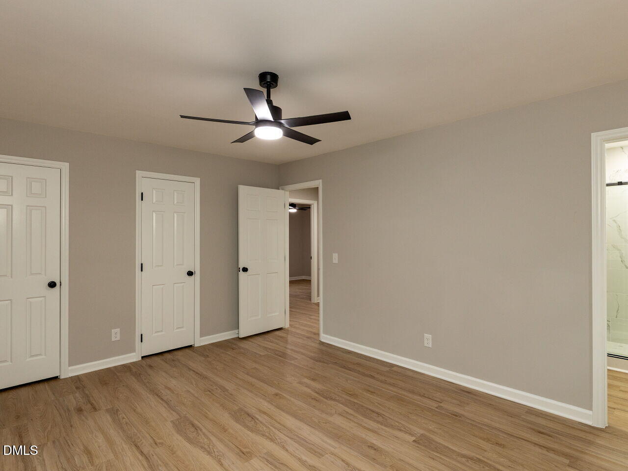 4800 Theys Road Raleigh, NC 27606 - Photo 19 of 43 a view of an empty room and wooden floor
