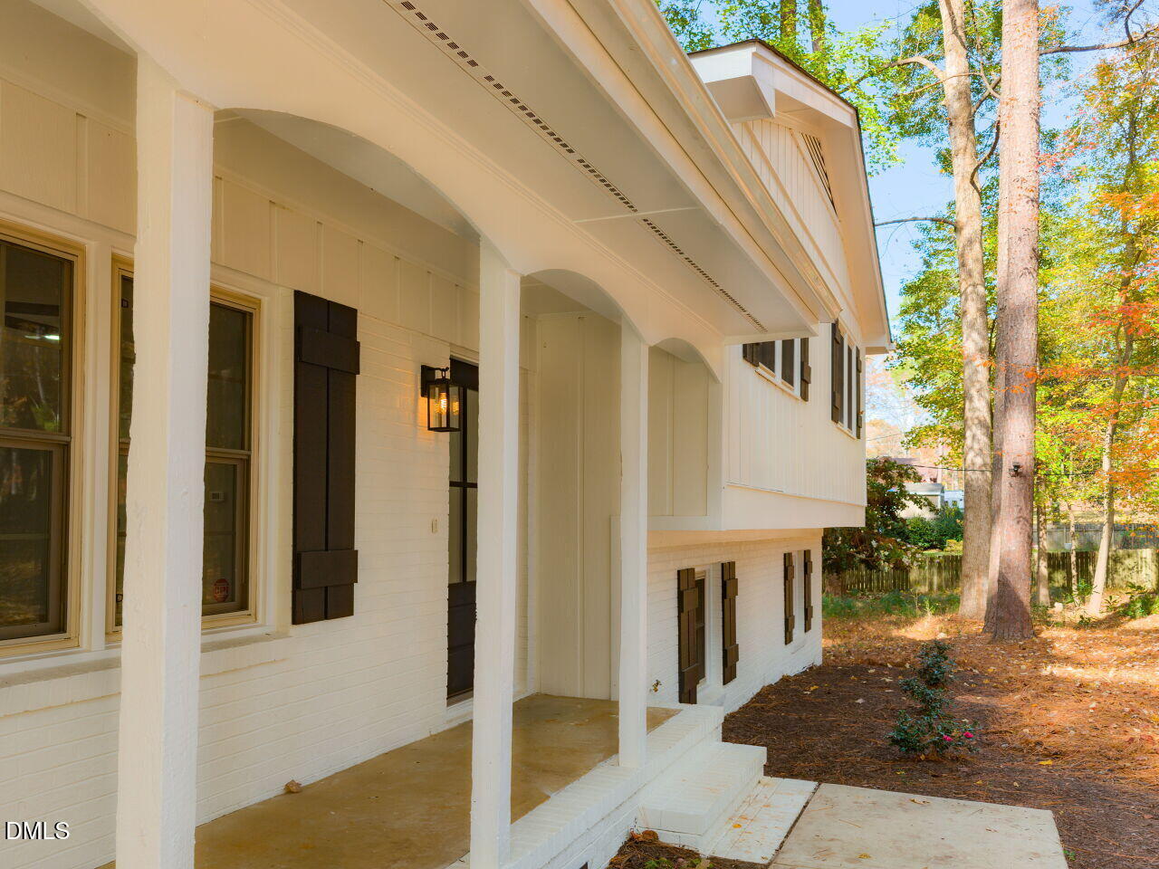 4800 Theys Road Raleigh, NC 27606 - Photo 4 of 43 a front view of a house with many windows