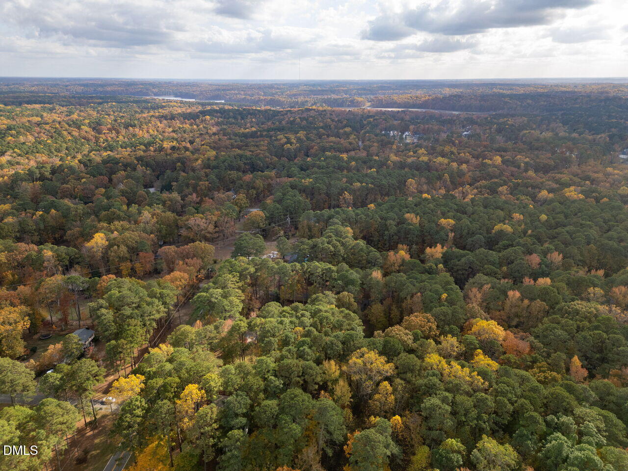 4800 Theys Road Raleigh, NC 27606 - Photo 41 of 43 an aerial view of house with yard and mountain view in back