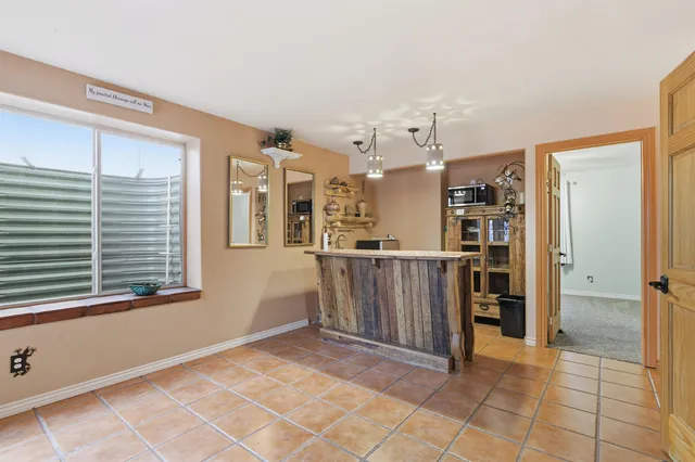 a view of a kitchen with a sink