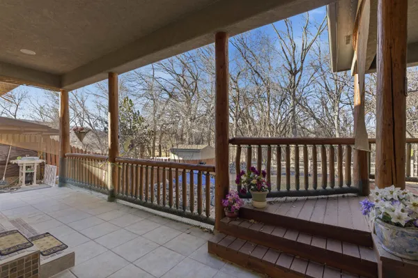 a view of a porch with a bench
