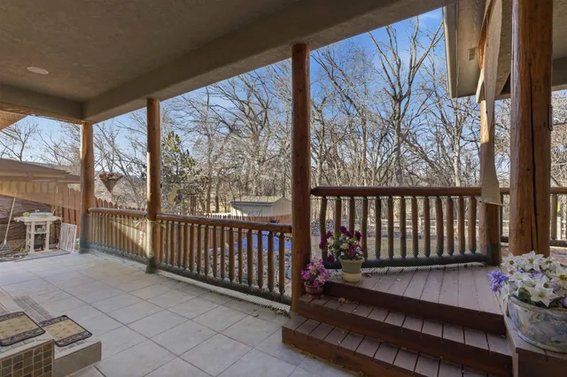 a view of a porch with a bench