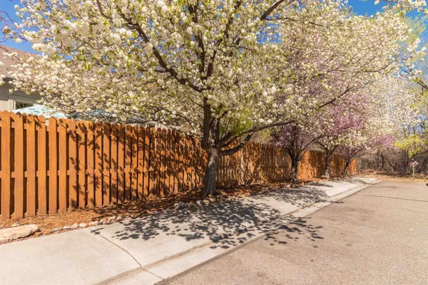 a view of wooden fence of a house