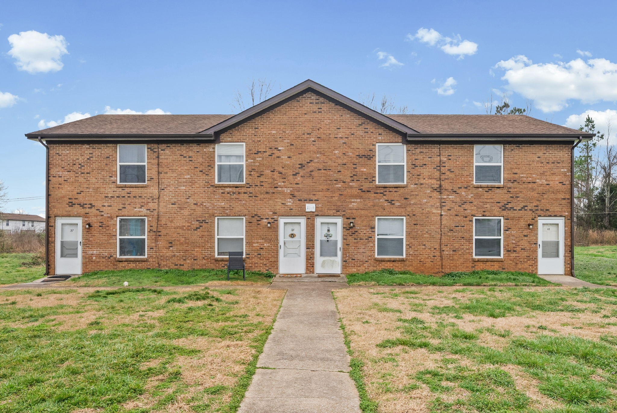1269 State Line Road, Unit 40 Oak Grove, KY 42262 - Photo 1 of 16 a front view of a house with brick walls