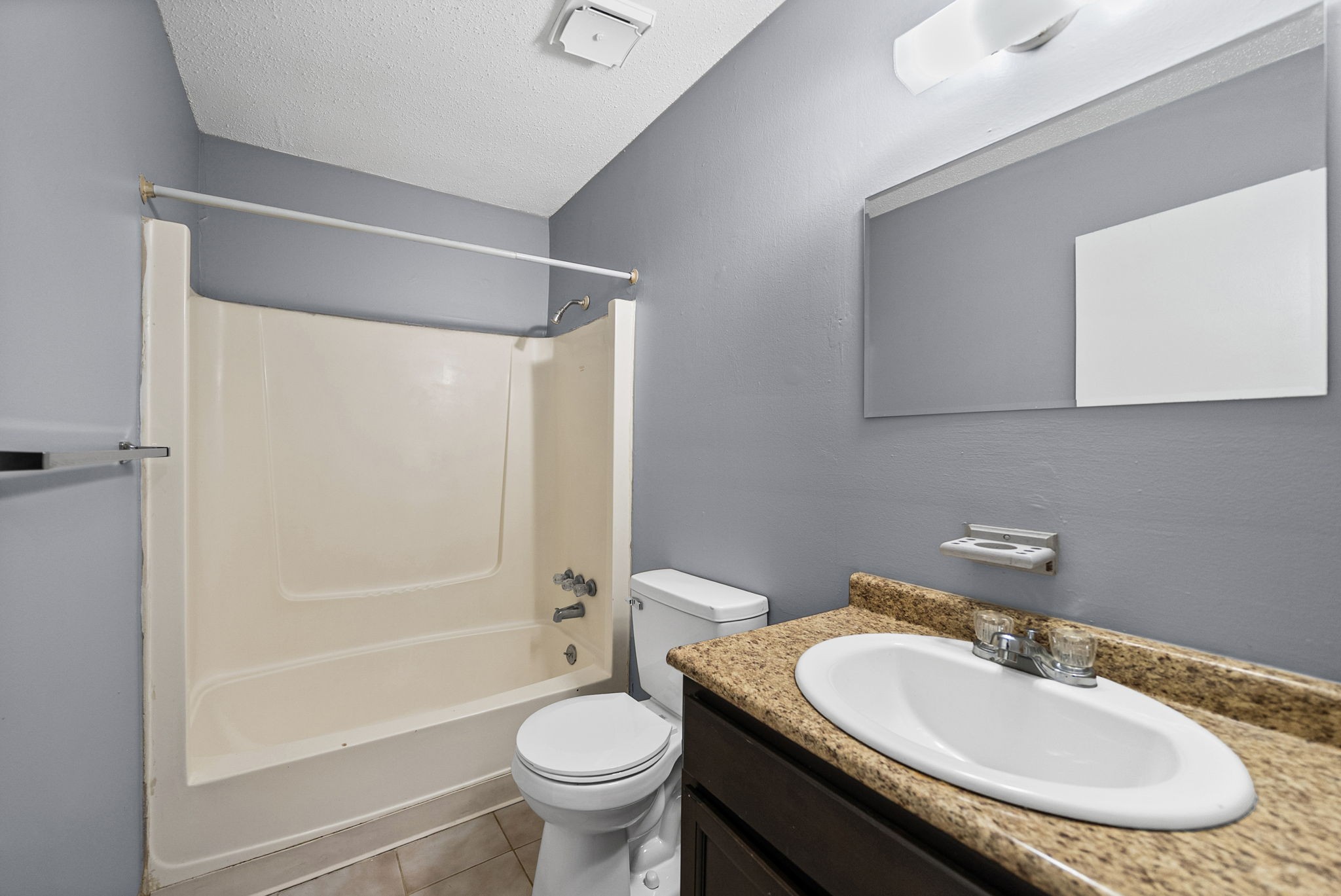 1269 State Line Road, Unit 40 Oak Grove, KY 42262 - Photo 11 of 16 a bathroom with a sink toilet and shower