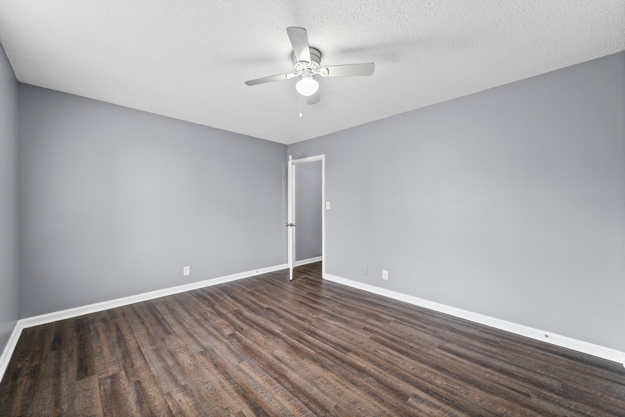 1269 State Line Road, Unit 40 Oak Grove, KY 42262 - Photo 13 of 16 a view of an empty room with wooden floor