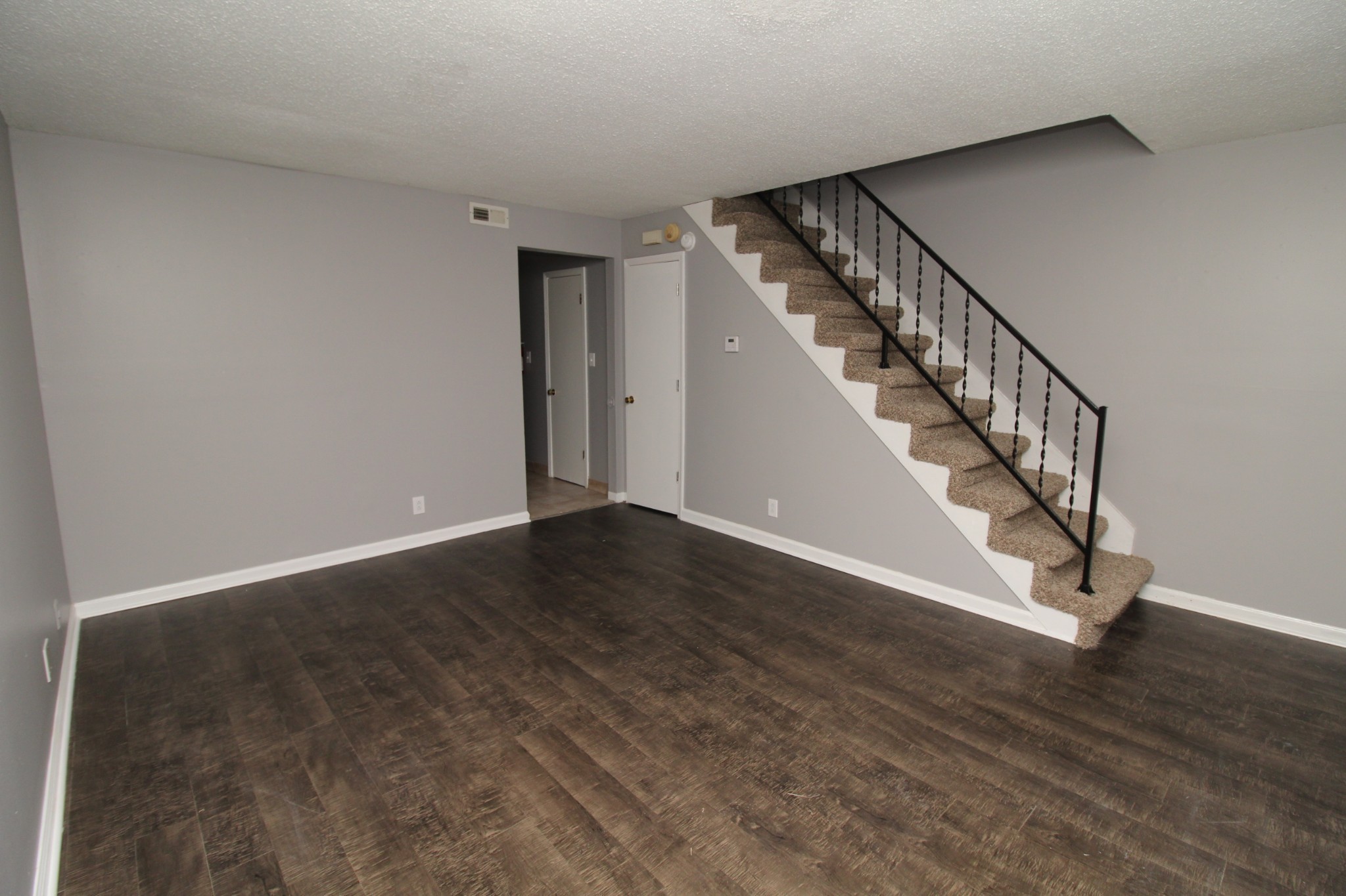1269 State Line Road, Unit 40 Oak Grove, KY 42262 - Photo 2 of 6 a view of an entryway with wooden floor