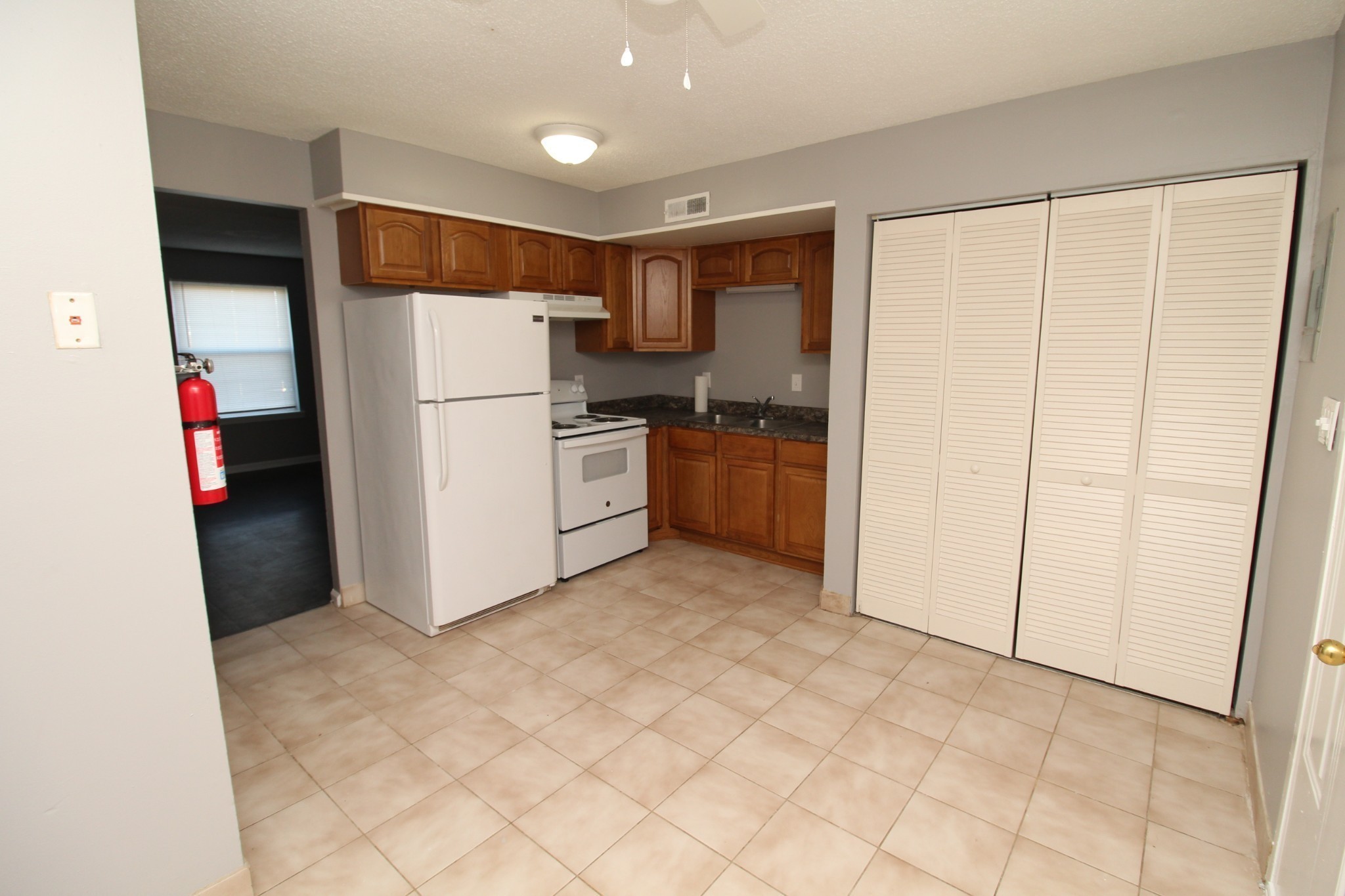 1269 State Line Road, Unit 40 Oak Grove, KY 42262 - Photo 3 of 6 a kitchen with stainless steel appliances a refrigerator and a sink