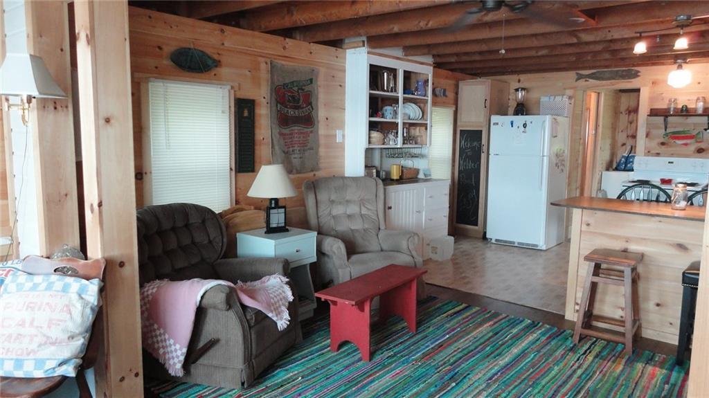 109 Pleasant Point Road Vassalboro, ME 04989 - Photo 24 of 27 Living room and kitchen
