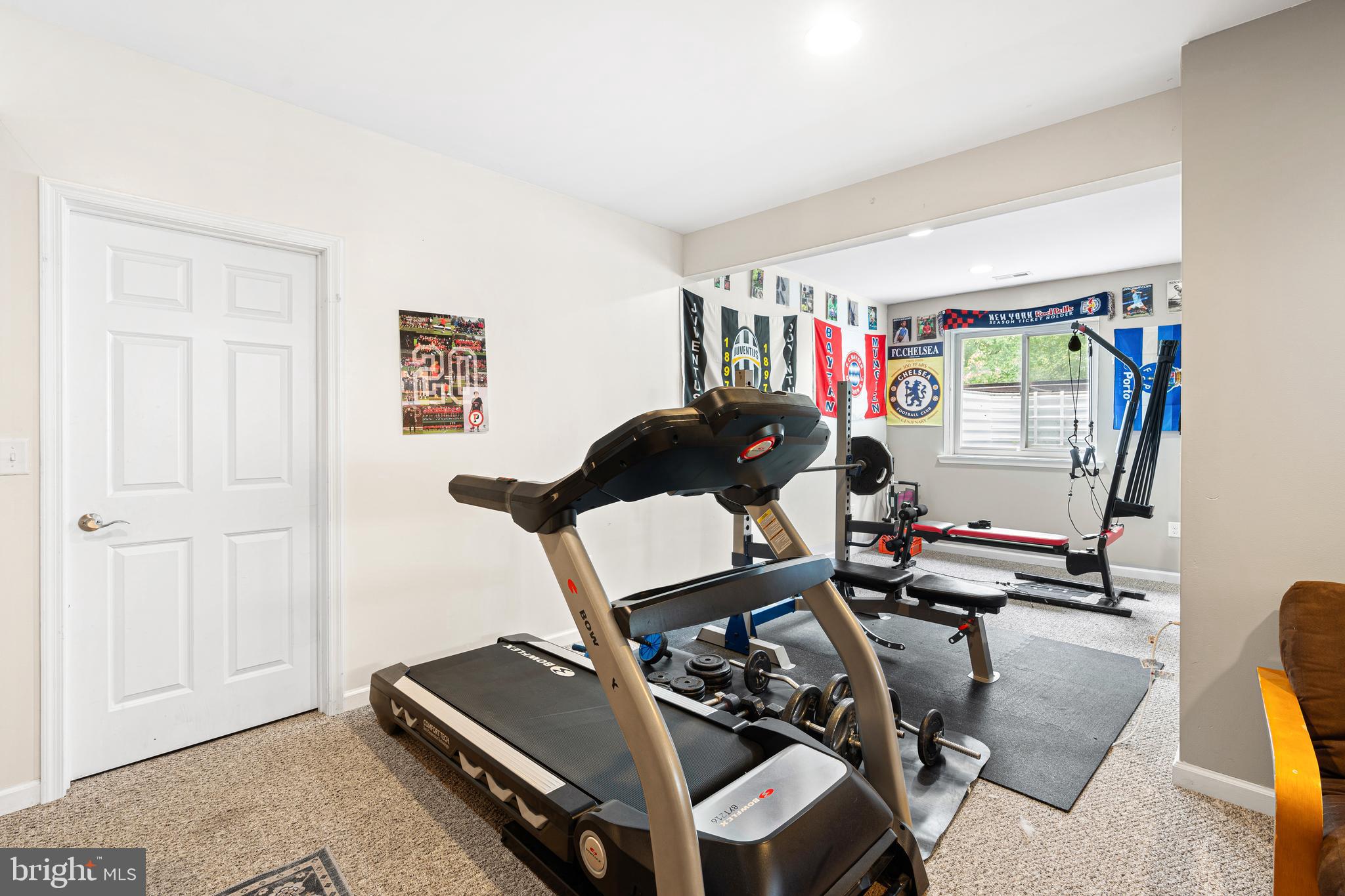 39 Brandon Road West Pennington, NJ 08534 - Photo 10 of 48 a room with gym equipment and a window