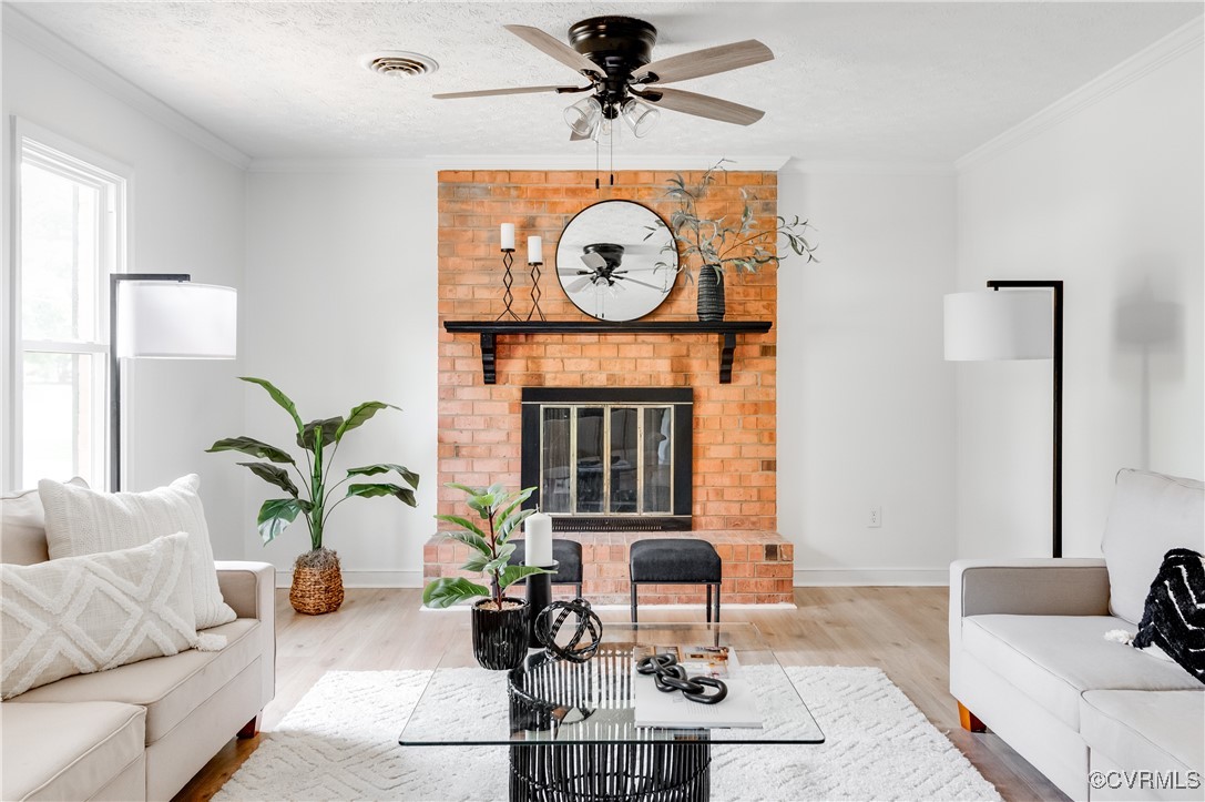 a living room with furniture a clock and a large mirror