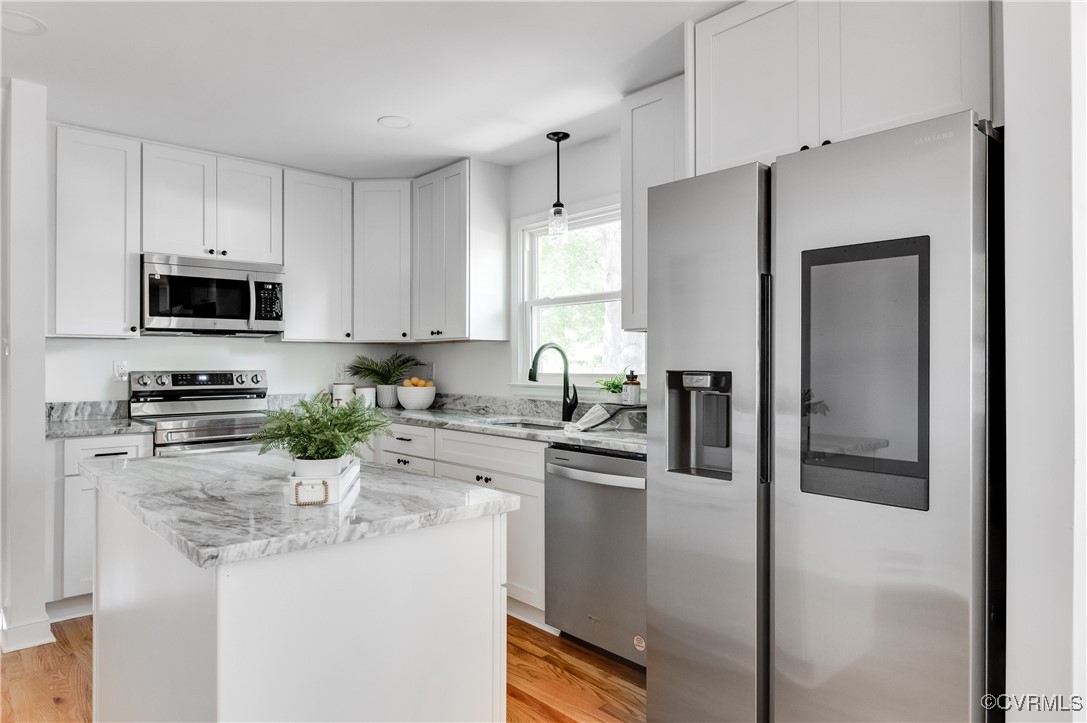 2840 Osborne Road Chester, VA 23831 - Photo 2 of 42 a kitchen with stainless steel appliances granite countertop a refrigerator a stove top oven a sink and dishwasher