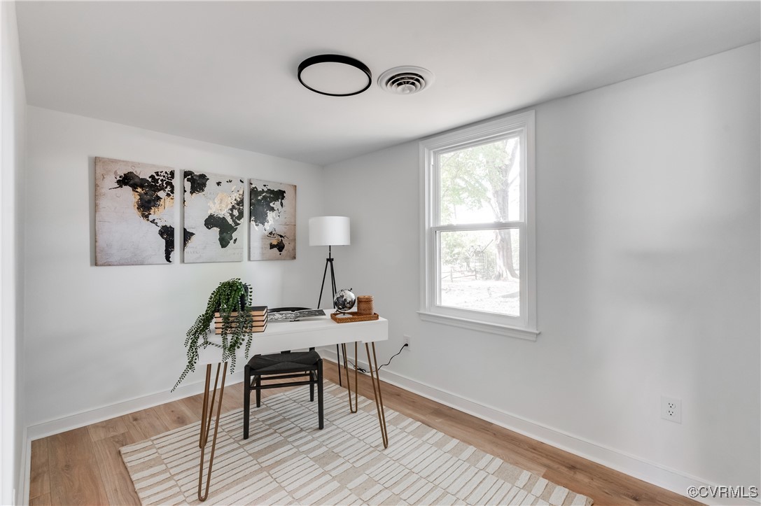 2840 Osborne Road Chester, VA 23831 - Photo 21 of 42 a view of a workspace with furniture and a window