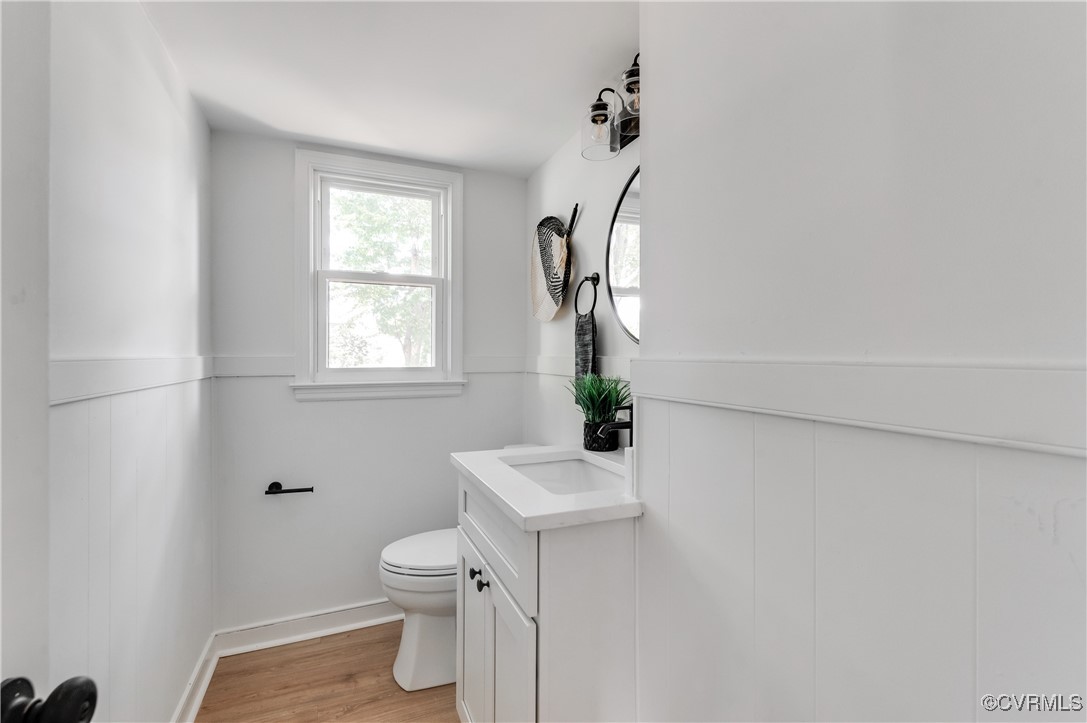 2840 Osborne Road Chester, VA 23831 - Photo 22 of 42 a bathroom with a sink toilet and a mirror
