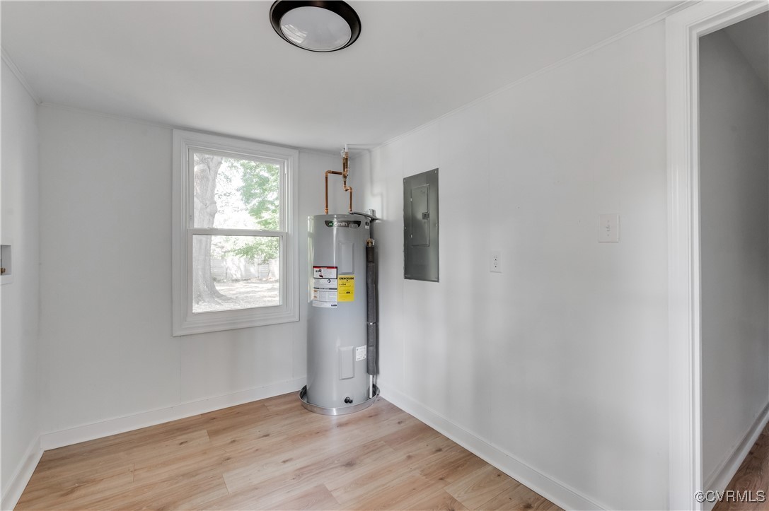 2840 Osborne Road Chester, VA 23831 - Photo 24 of 42 a view of empty room with window and wooden floor