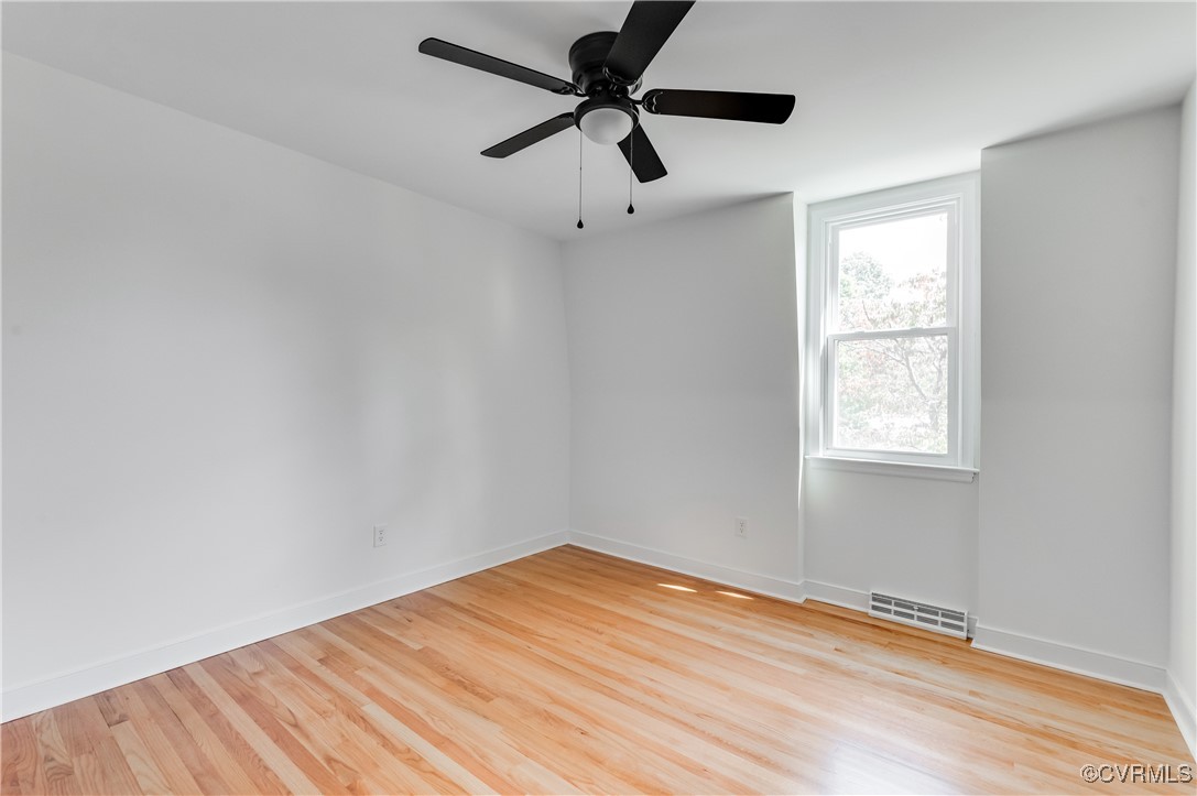 2840 Osborne Road Chester, VA 23831 - Photo 29 of 42 a view of empty room with wooden floor and fan