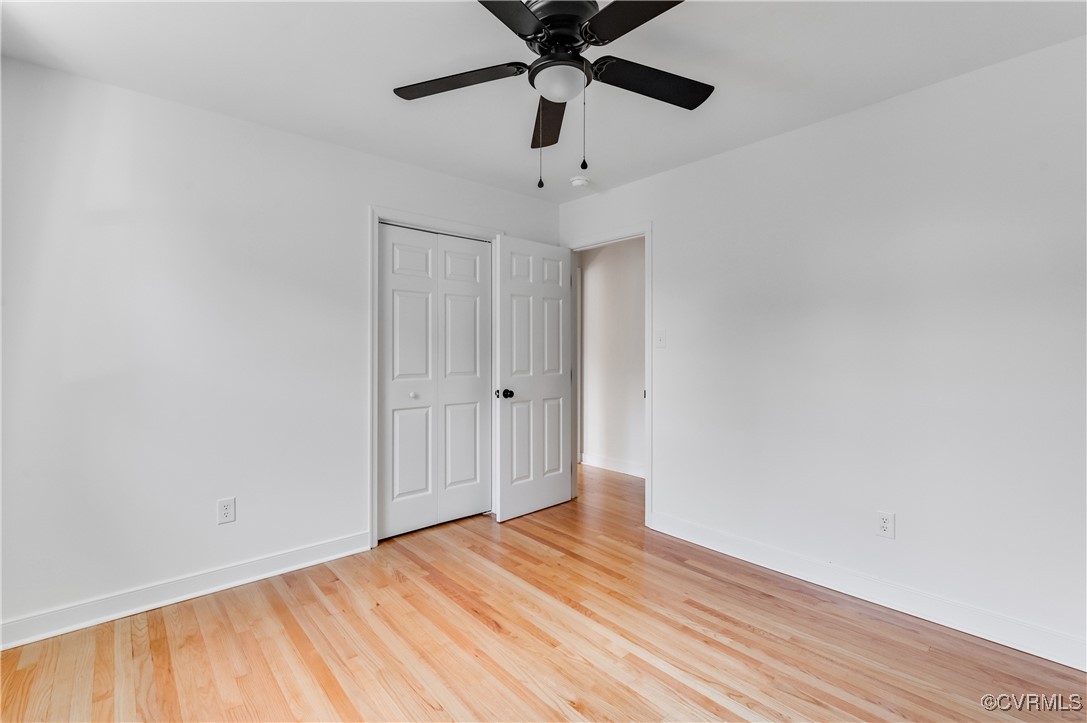 2840 Osborne Road Chester, VA 23831 - Photo 30 of 42 a view of an empty room with window and wooden floor