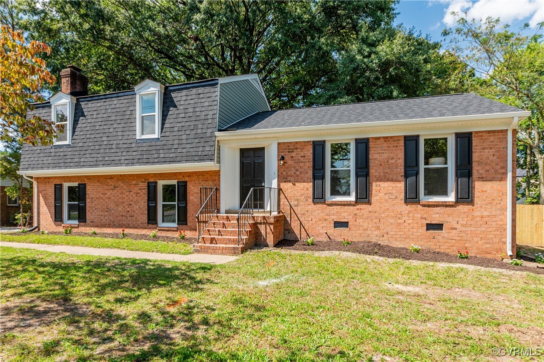 2840 Osborne Road Chester, VA 23831 - Photo 36 of 42 a front view of a house with a yard table and chairs