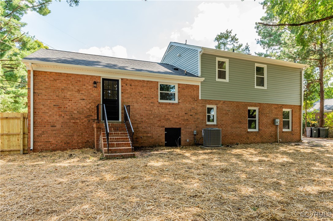 2840 Osborne Road Chester, VA 23831 - Photo 40 of 42 a view of a house with a backyard