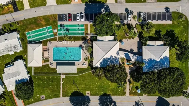 an aerial view of a house with a garden
