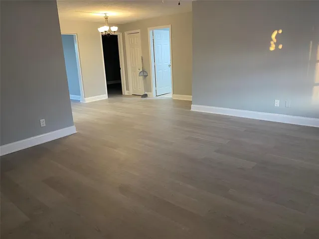 a view of a room with a hallway