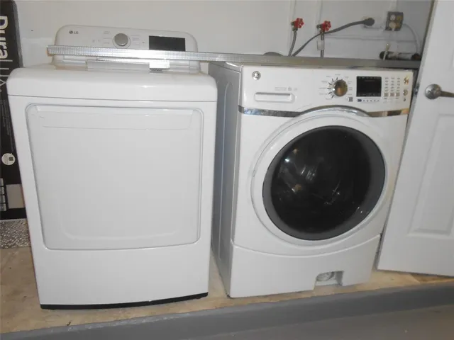 a utility room with dryer and washer