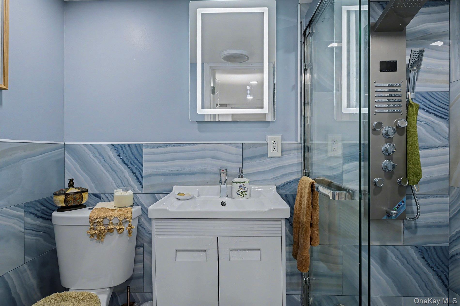 24 Cedar Road Westbury, NY 11590 - Photo 20 of 22 a utility room with dryer and washer