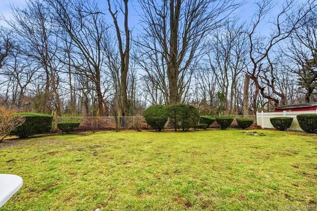 a house with trees in front of it