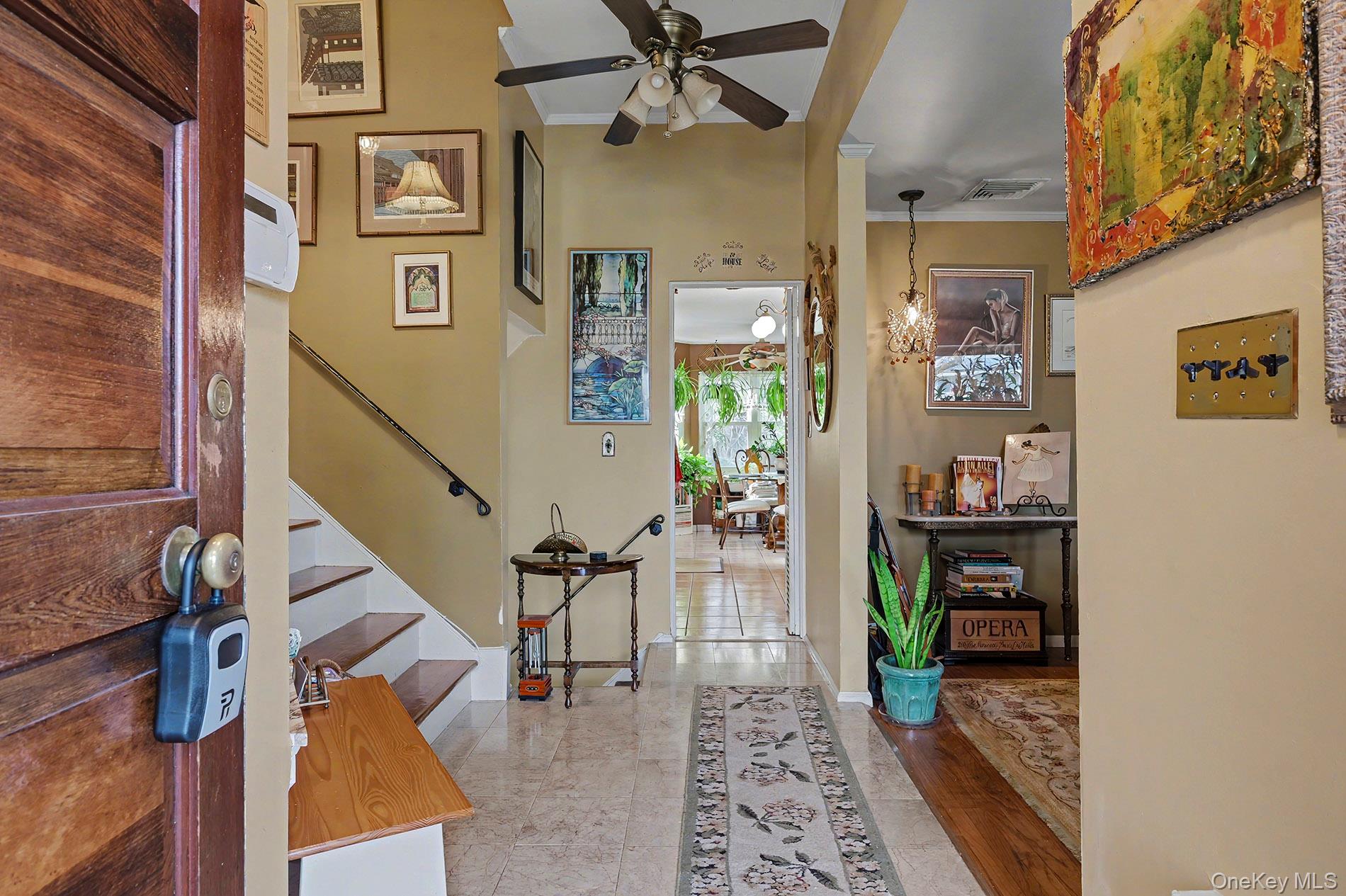 24 Cedar Road Westbury, NY 11590 - Photo 3 of 22 a view of a hallway with seating area