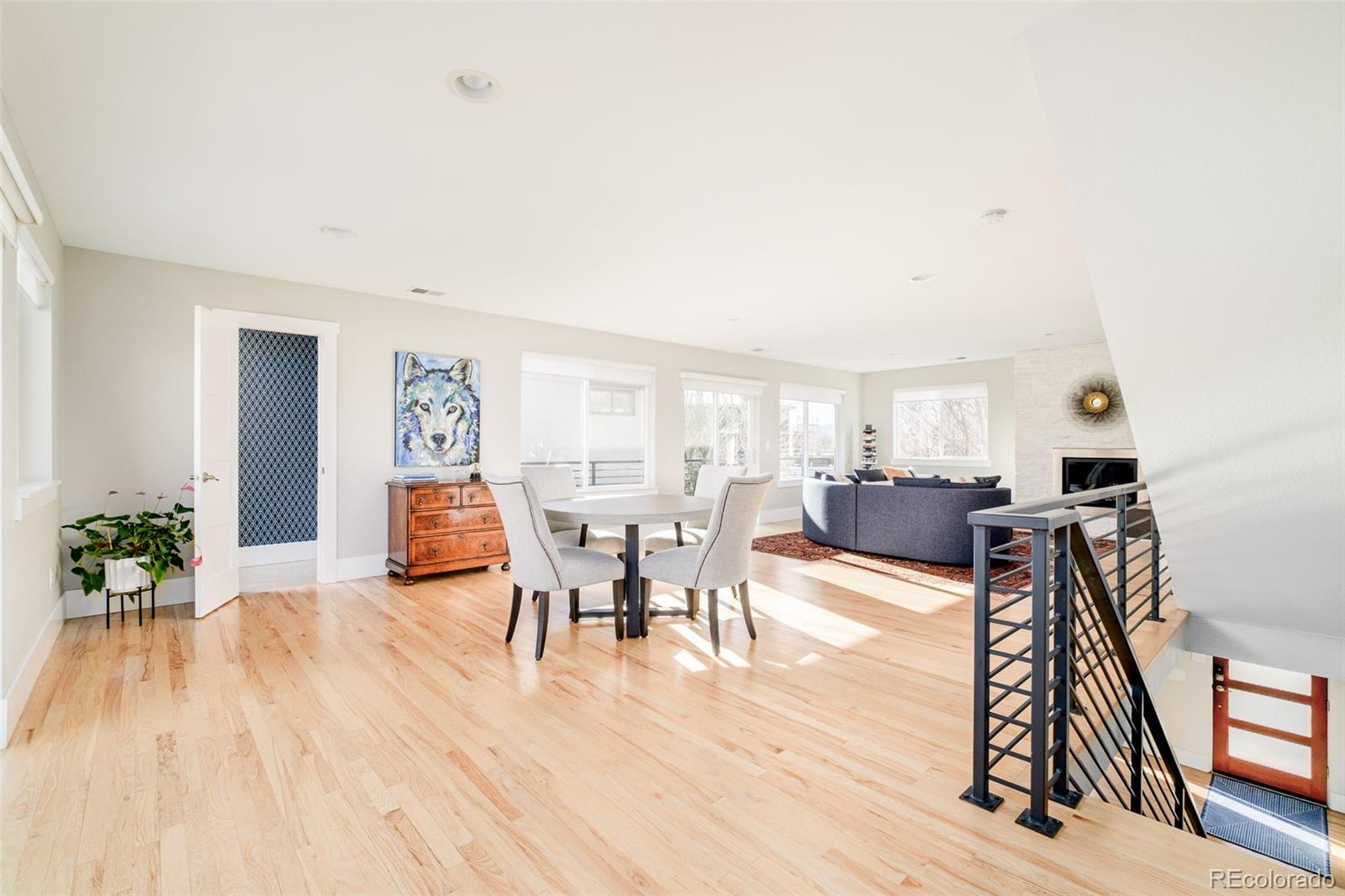 2048 Meade Street Denver, CO 80211 - Photo 18 of 50 a living room with furniture and a wooden floor