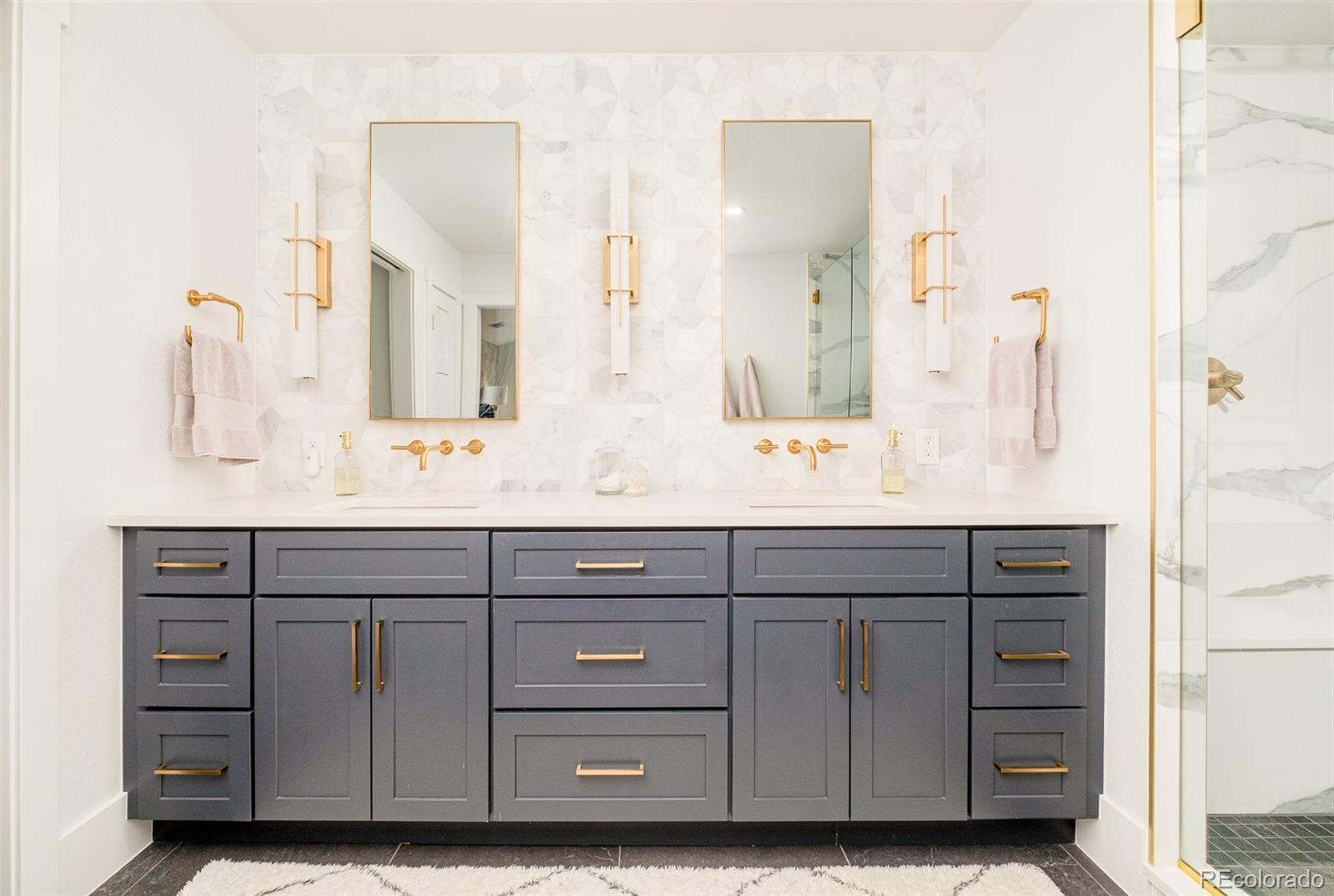 2048 Meade Street Denver, CO 80211 - Photo 23 of 50 a bathroom with a sink vanity granite and a mirror