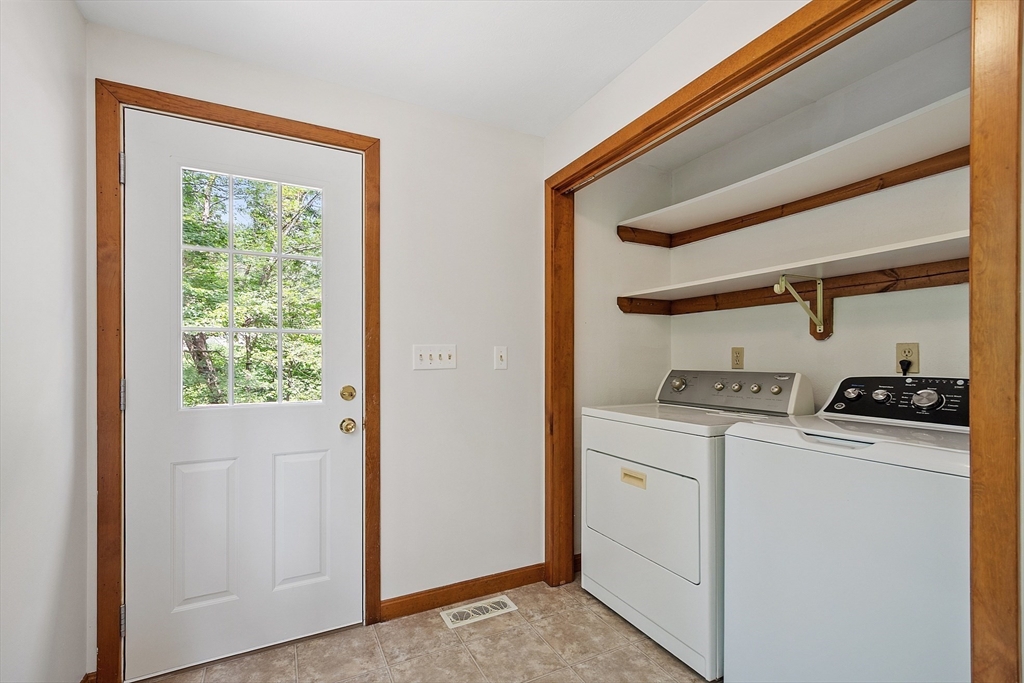 14 Boat House Road Groton, MA 01450 - Photo 16 of 41 a view of storage and utility room with washer and dryer