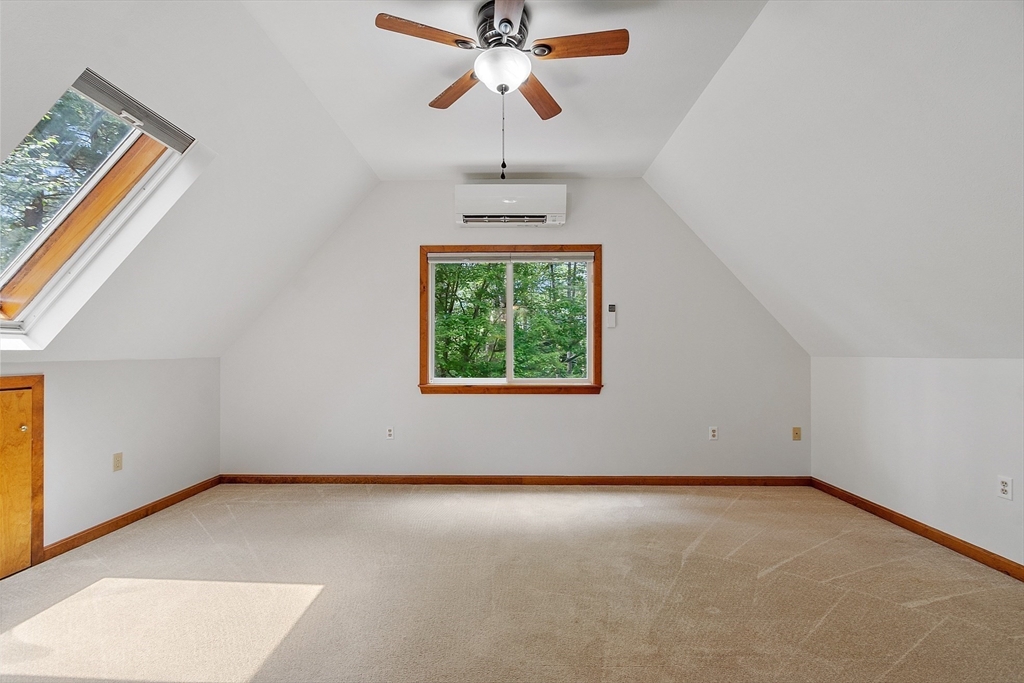 14 Boat House Road Groton, MA 01450 - Photo 20 of 41 an empty room with windows and fan