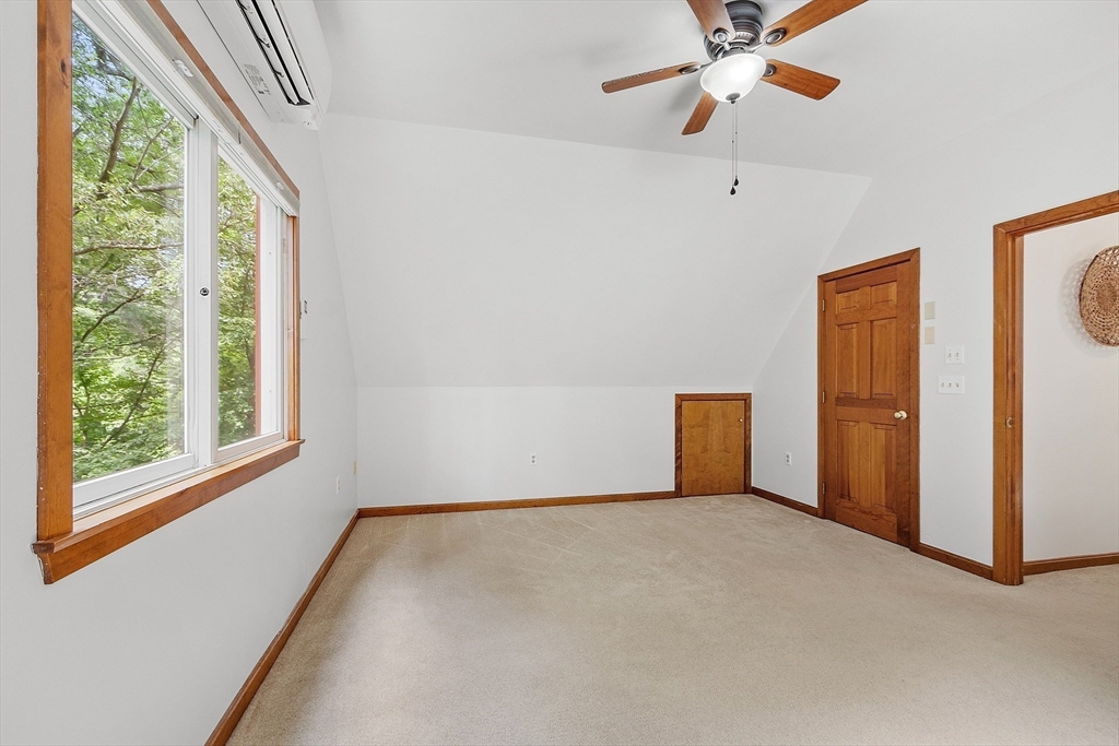 14 Boat House Road Groton, MA 01450 - Photo 21 of 41 a view of an empty room with a window