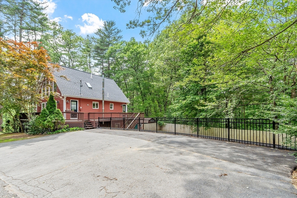 14 Boat House Road Groton, MA 01450 - Photo 26 of 41 a view of a house with a yard