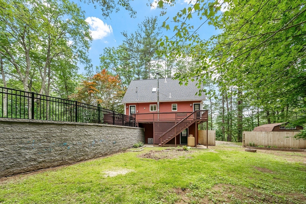 14 Boat House Road Groton, MA 01450 - Photo 29 of 41 a view of a house with a backyard