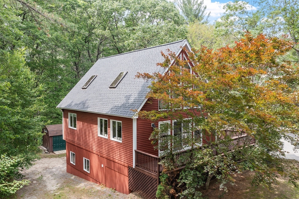 14 Boat House Road Groton, MA 01450 - Photo 5 of 41 a aerial view of a house with a yard and balcony