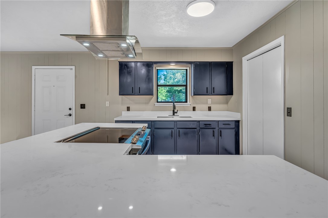 104 North Oneal Street Caldwell, TX 77836 - Photo 11 of 22 a kitchen with a sink cabinets and window