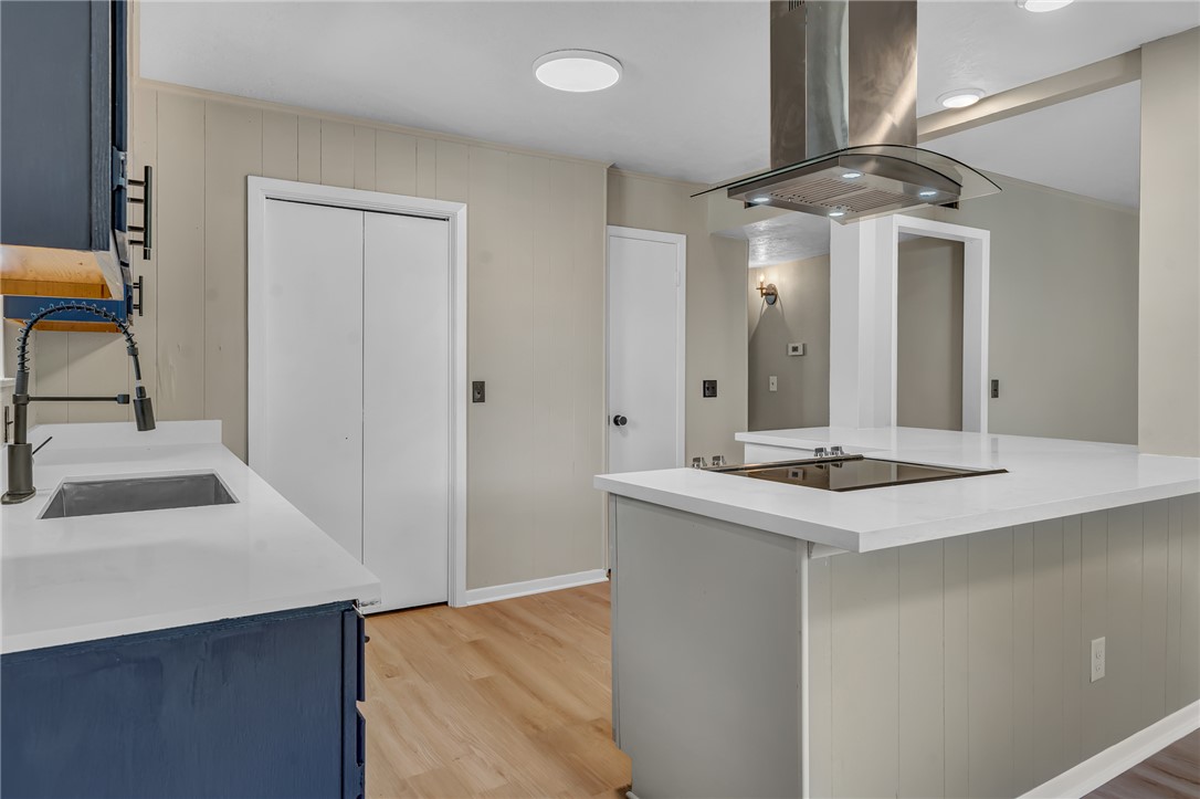 104 North Oneal Street Caldwell, TX 77836 - Photo 12 of 22 a kitchen with a sink and a refrigerator