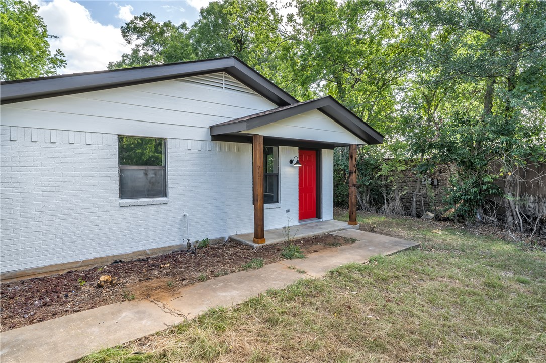 104 North Oneal Street Caldwell, TX 77836 - Photo 4 of 22 a view of wooden house with large trees