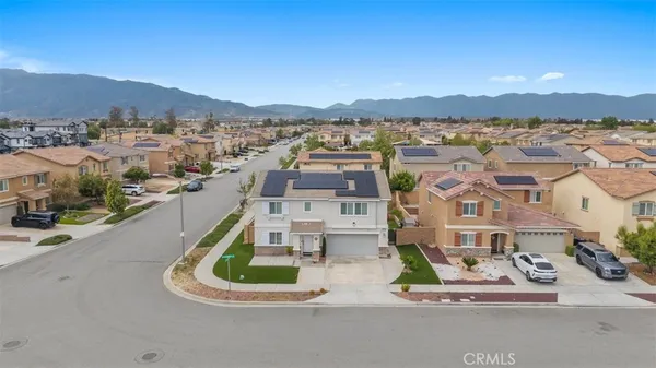 a picture of houses with a city view