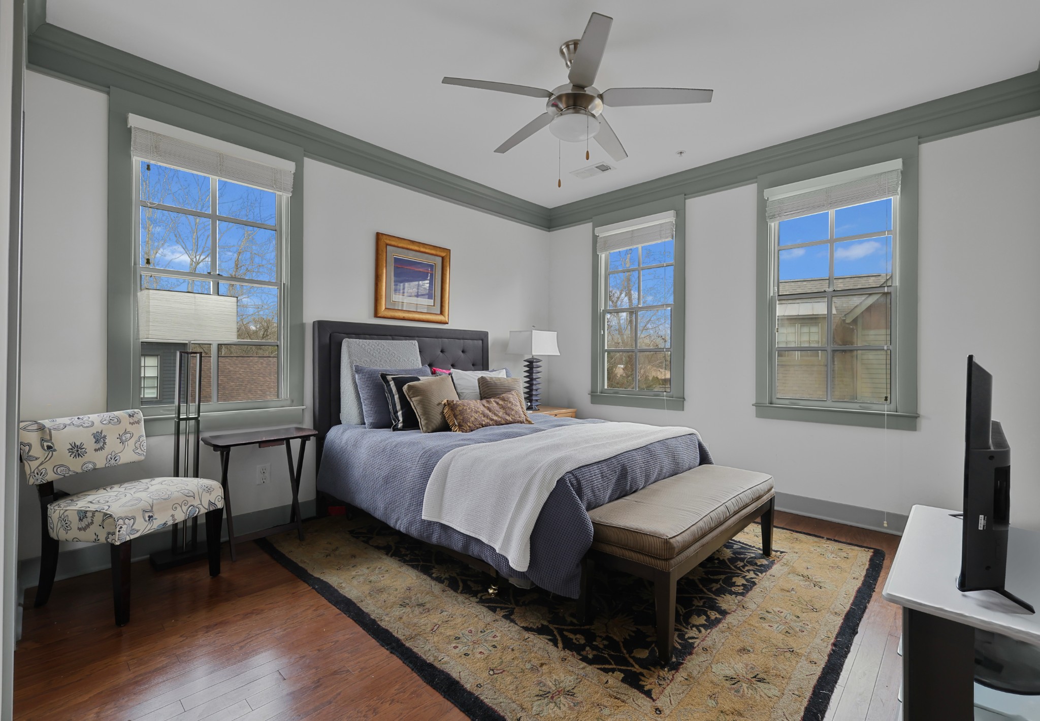 101 Cottage Lane Franklin, TN 37064 - Photo 15 of 20 a bedroom with a bed wooden floor and a table