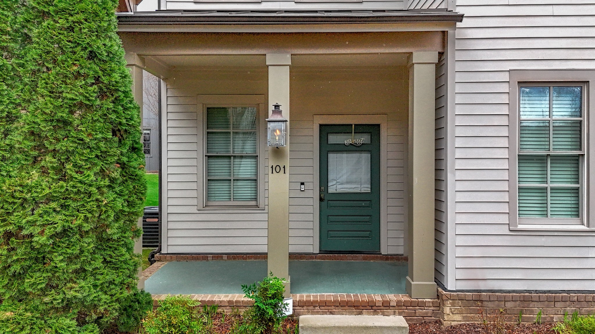 101 Cottage Lane Franklin, TN 37064 - Photo 3 of 20 a front view of a house with a garage