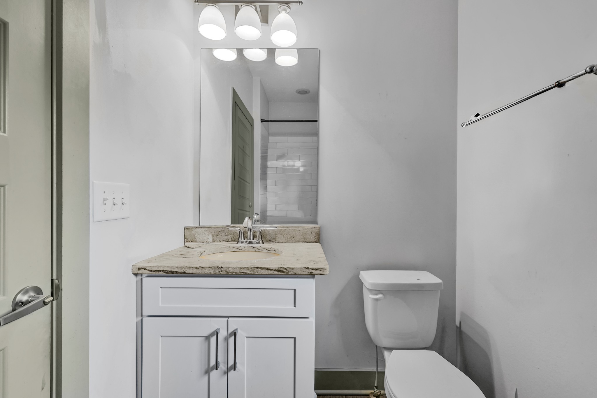 101 Cottage Lane Franklin, TN 37064 - Photo 8 of 20 a bathroom with a granite countertop toilet sink and mirror