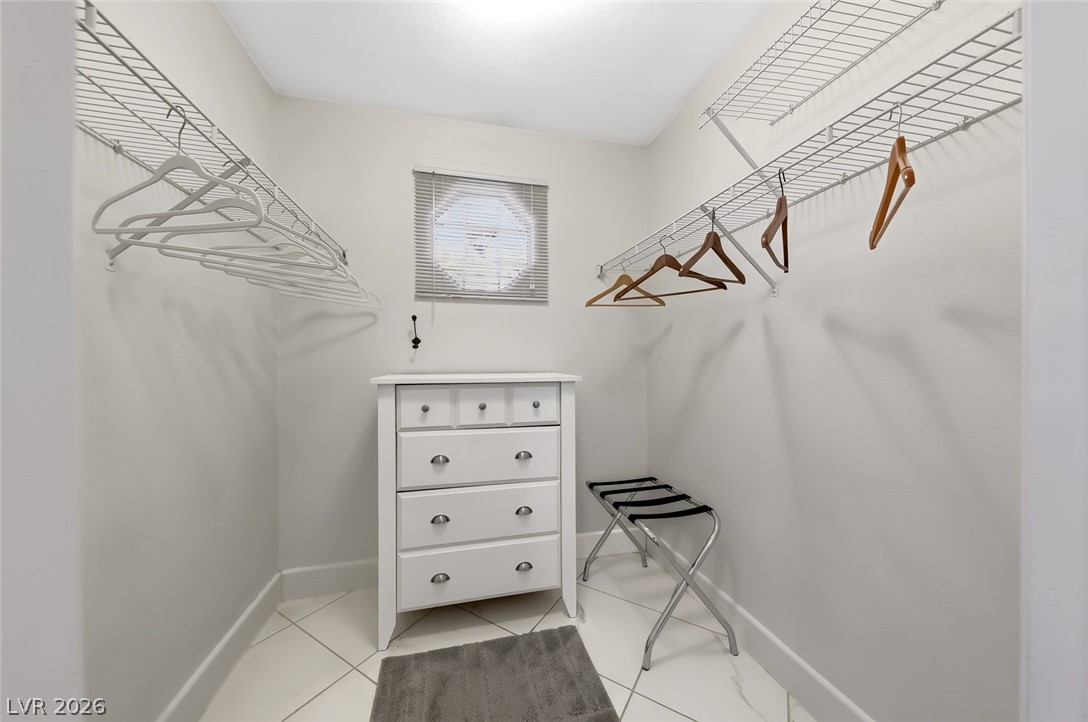 10 Rising Sun Court Henderson, NV 89074 - Photo 24 of 38 Primary bedroom walk-in closet.