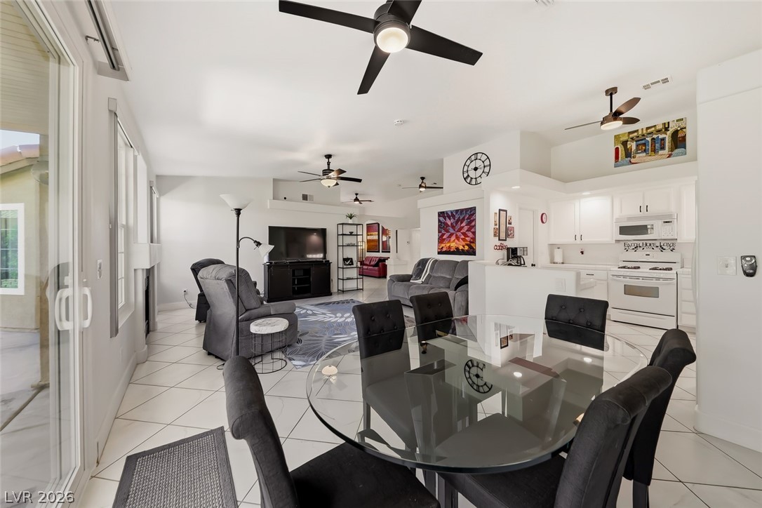 10 Rising Sun Court Henderson, NV 89074 - Photo 7 of 38 Dining room off the kitchen with views of the backyard.